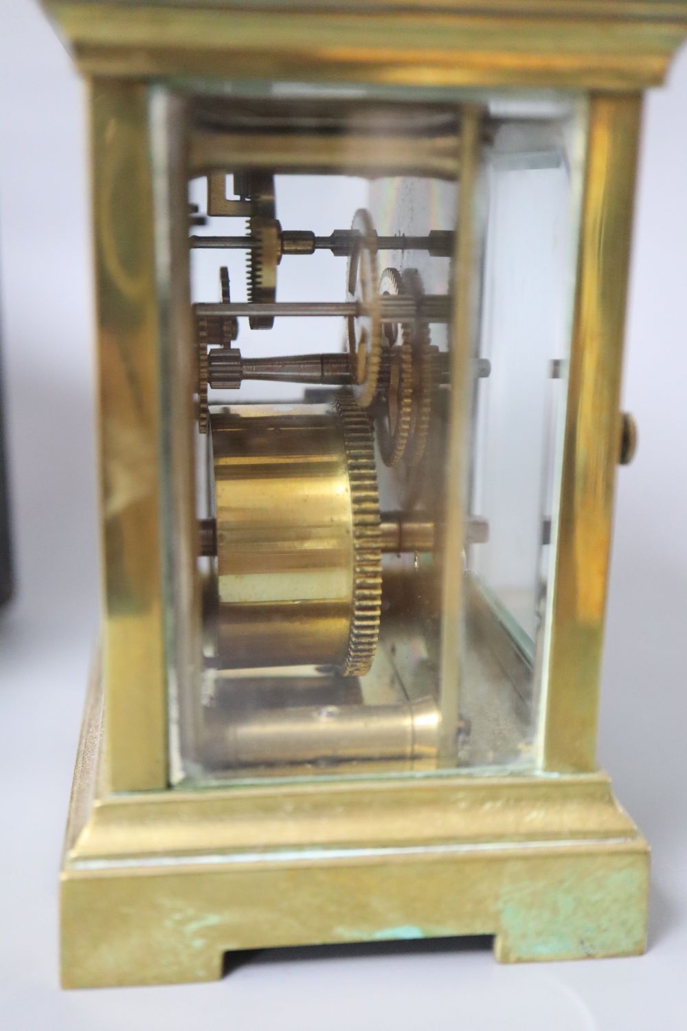 A French brass carriage timepiece with outer carrying case